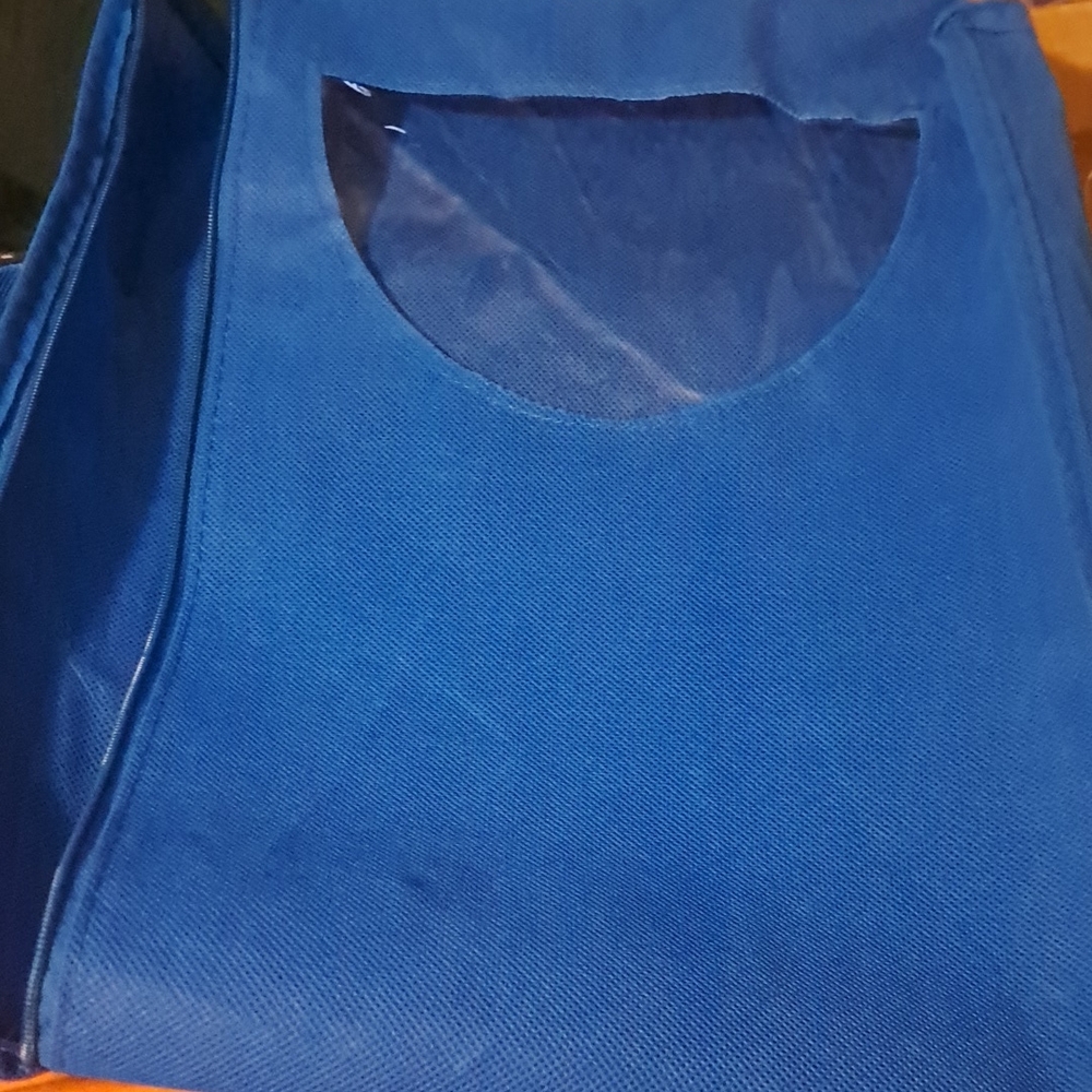 Packable travel pouch with handle and window